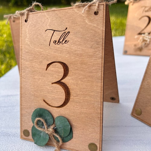 Eucalyptus & Floral Wooden Wedding Table Numbers – Rustic Birch Wood Double-Sided Table Signs