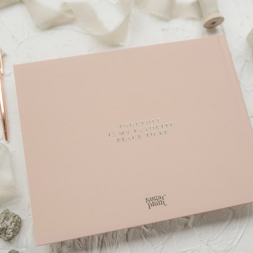 Elegant Wedding Guest Book with Ornate Crest Design