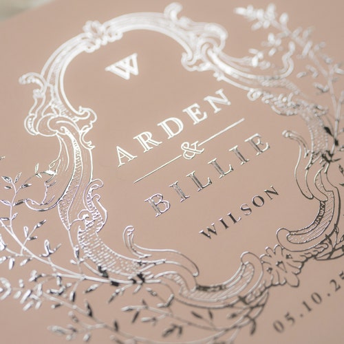 Elegant Wedding Guest Book with Ornate Crest Design
